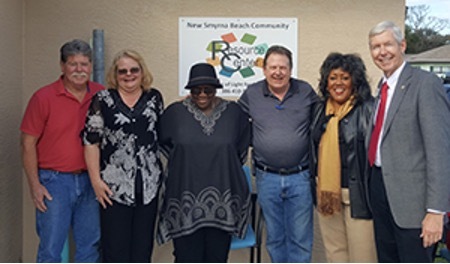 From left to right: Randy Hartman, City Commissioner - Zone 4, Teresa Pope, NSBHA Executive Director, Fannie Mae Hudson, Jim Hathaway, Mayor, and Donna Banks and Tony Otte, both with Community Redevelopment for the City of New Smyrna Beach attend the ribbon cutting for the new community resource center