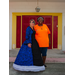 Two ladies in front of a door.