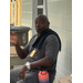  Maintenance man Mr. T sitting down and waving at the camera 